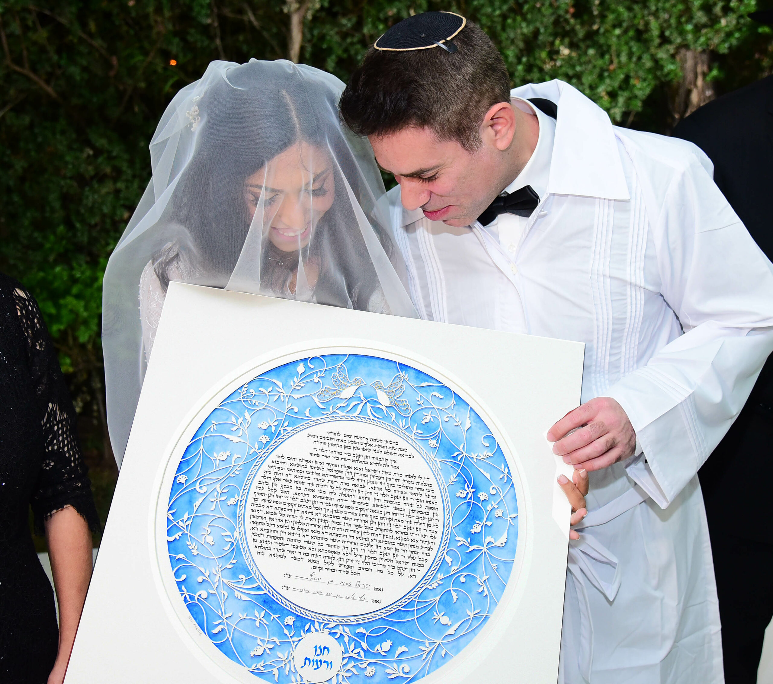 A modern Jewish couple with their unique, contemporary style Ketubah.